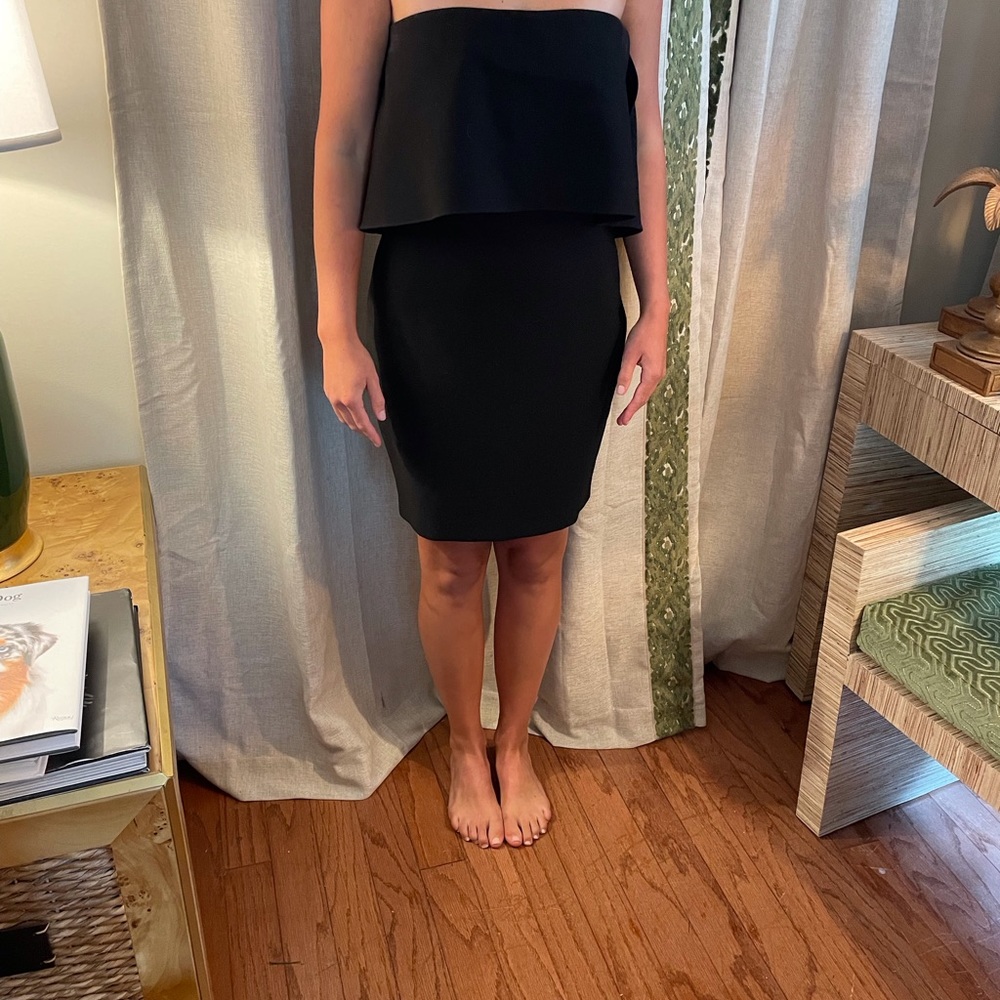 Likely black strapless dress.